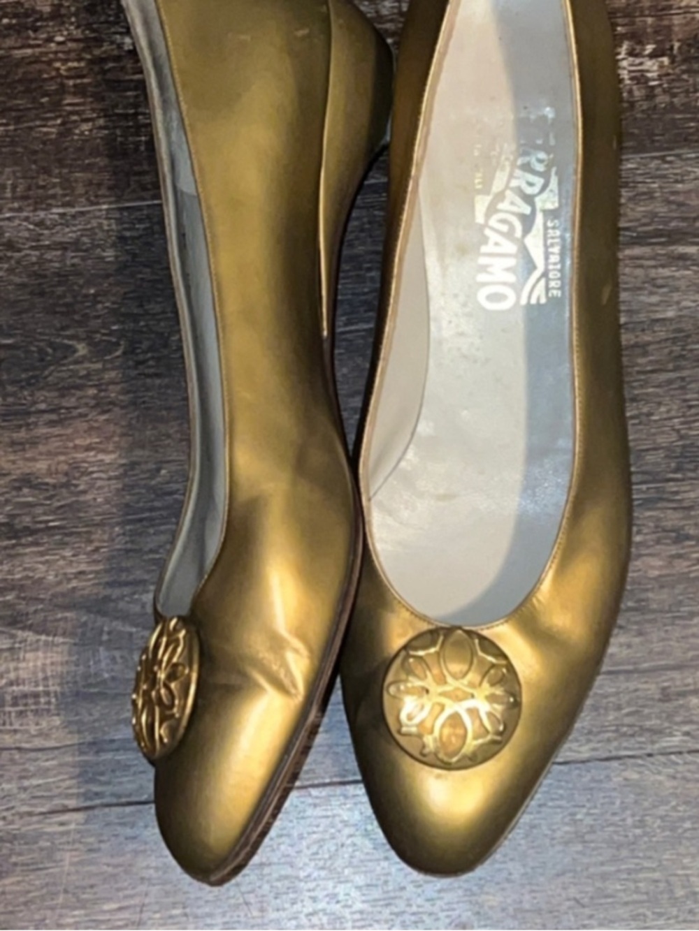 Salvatore Ferragamo Metallic Gold Round-Toe Ballet Flats with Medallion